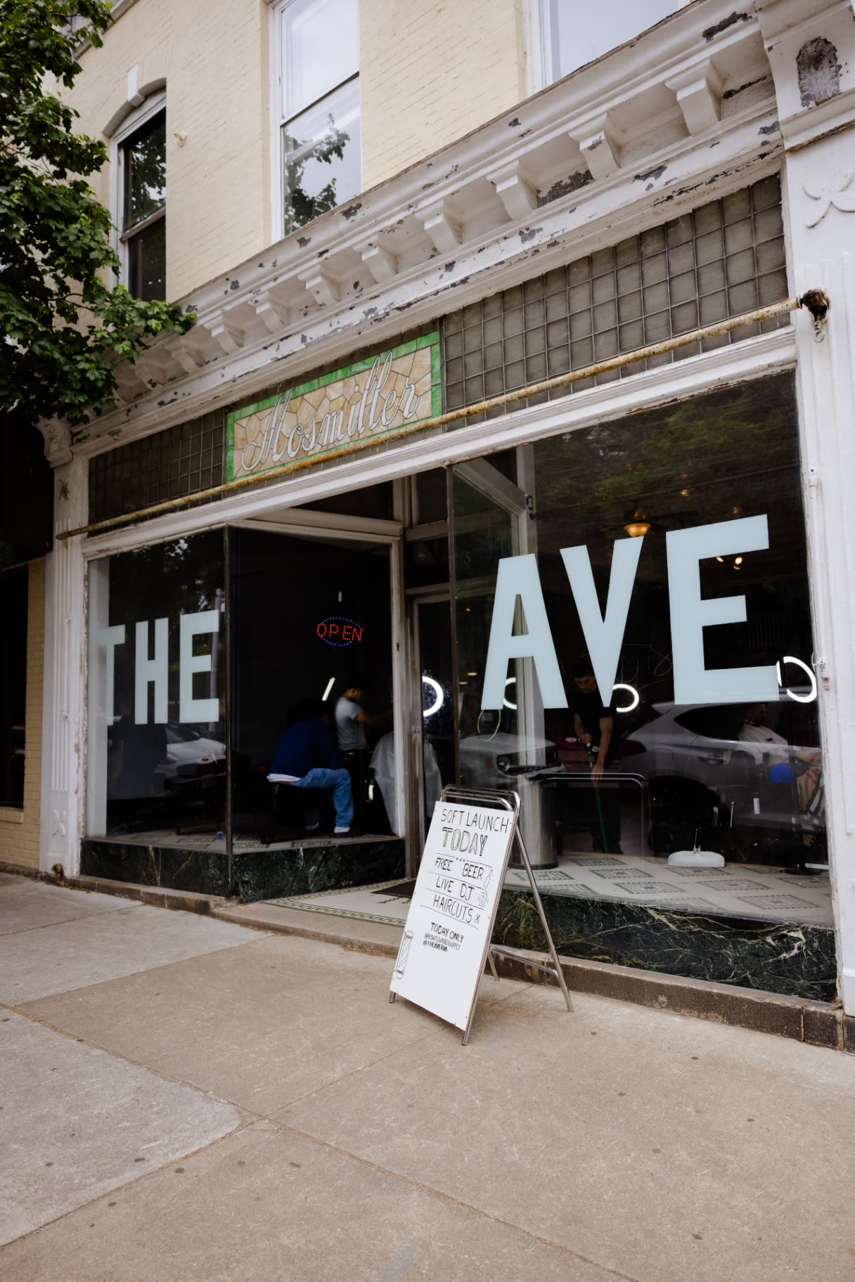 The Ave Barbershop storefront on E Main St in Richmond, Virginia