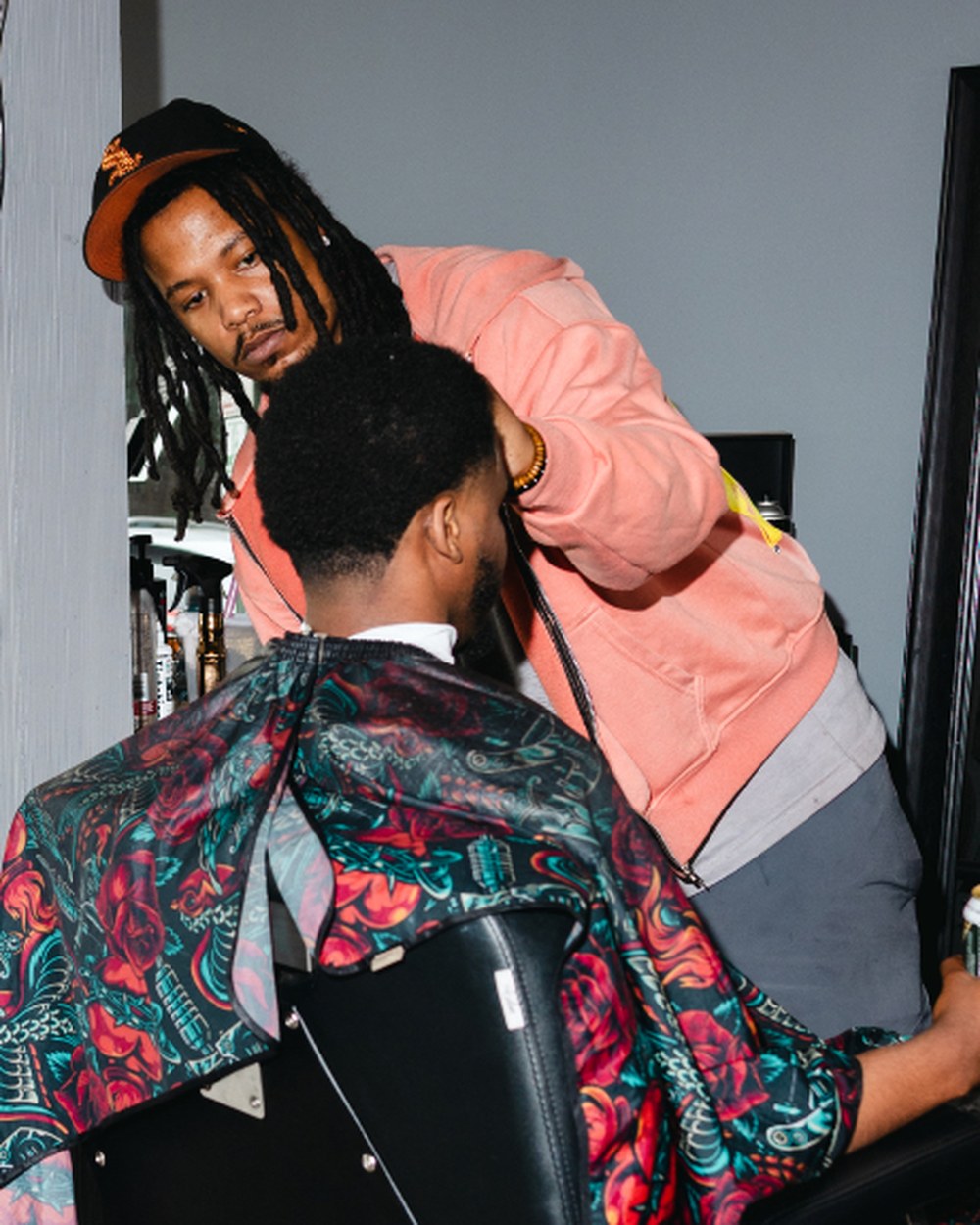 Spank, barber at The Ave Barbershop