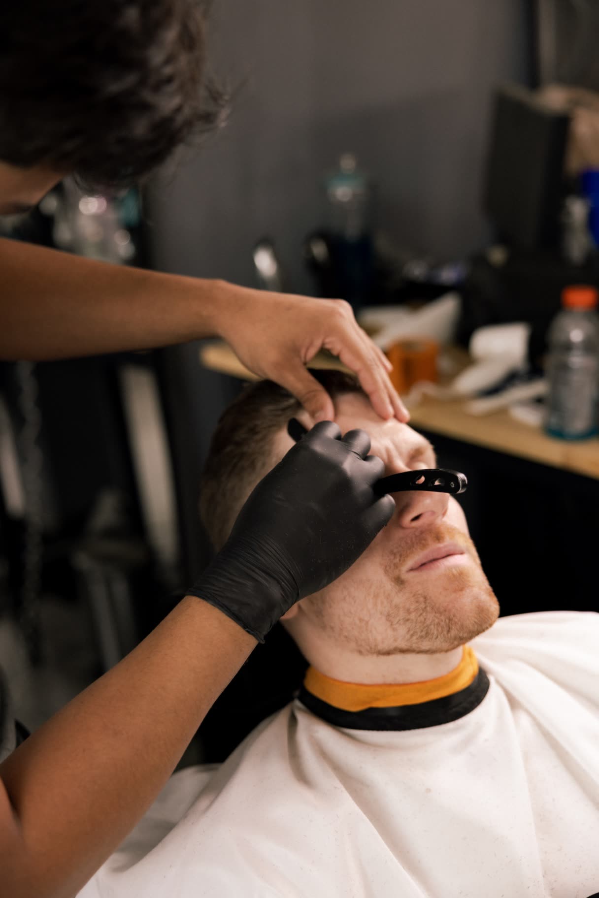 Straight razor detail work on a client's beard